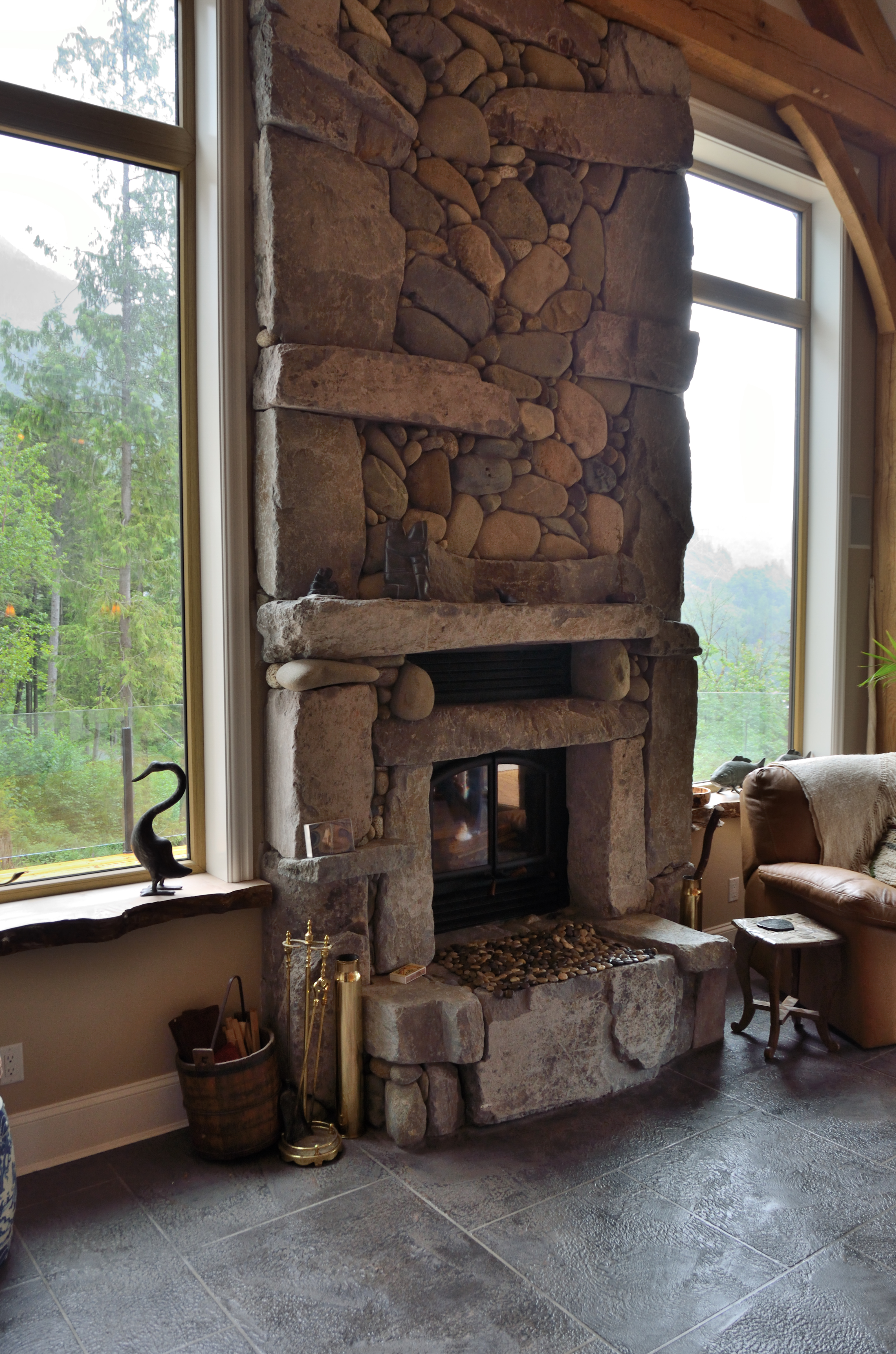Rustic stone fireplace with StoneCraft textured flooring