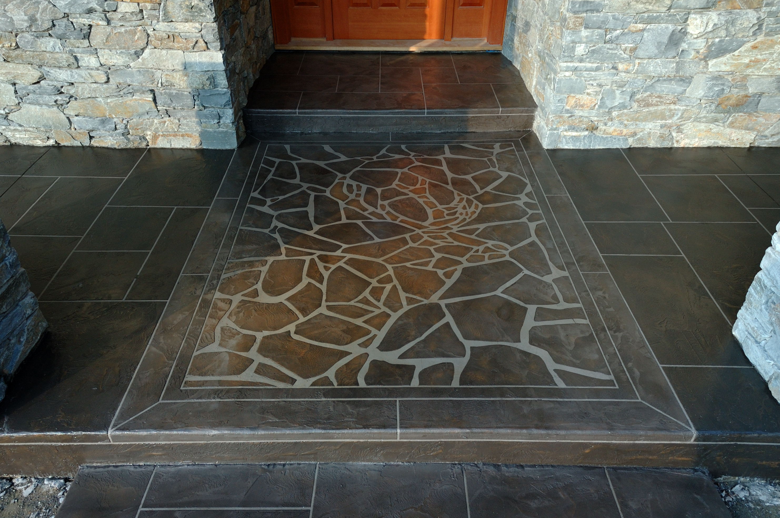 Residential foyer with custom StoneCraft stone mosaic inlay