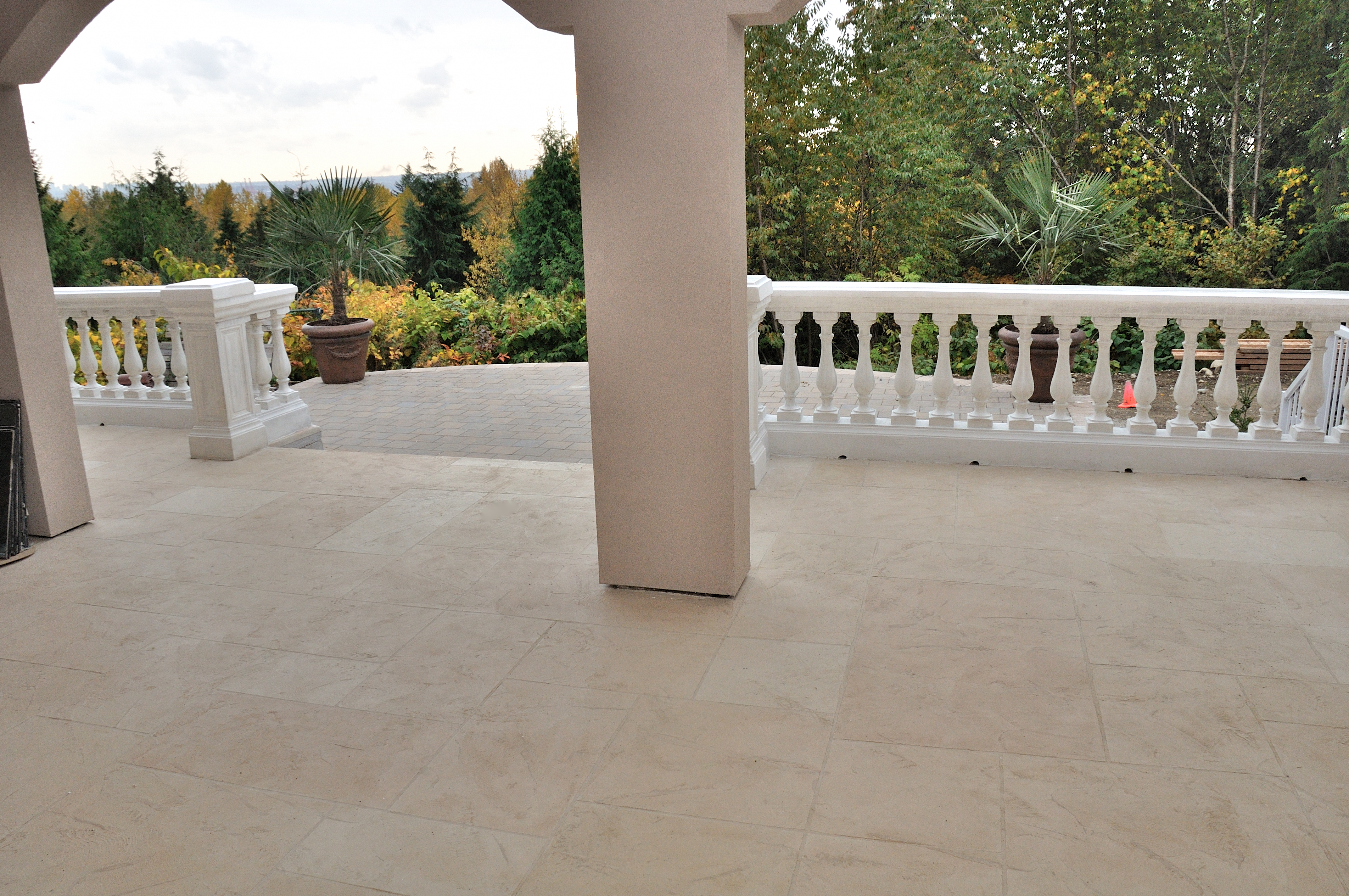 StoneCraft outdoor patio and balcony surfacing with elegant balustrade